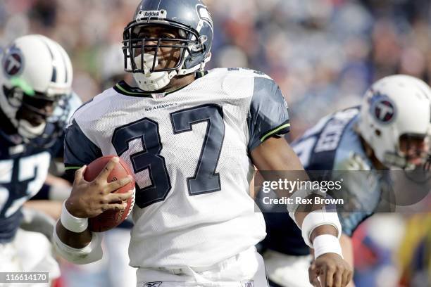 Seattle's Shaun Alexander goes in for the Seahawks second touchdown of the day against the Titans December 18 at the Coliseum, in Nashville,...