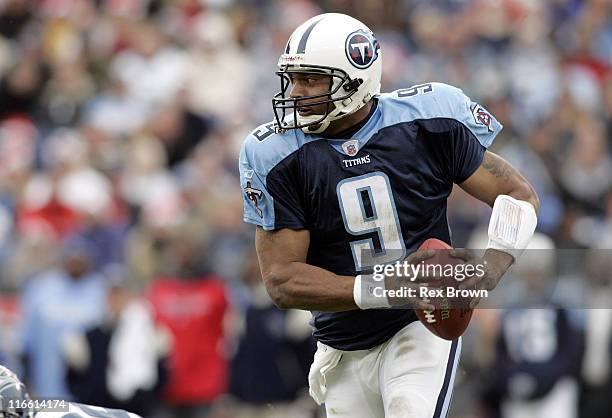 Tennessee's Steve McNair rolls out to pass against Seattle December 18 at the Coliseum, in Nashville, Tennessee. Seattle defeated Tennessee 28-24.
