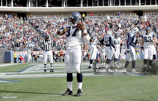 Seattle's Shaun Alexander celebrates Seattle's second touchdown of the day to go up 14-0 over Tennessee December 18 at the Coliseum, in Nashville,...