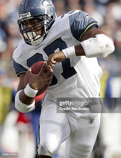 Seattle's Shaun Alexander in actions against the Titans December 18 at the Coliseum, in Nashville, Tennessee. Seattle defeated Tennessee 28-24.