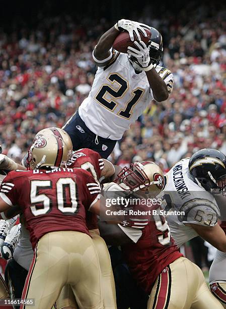 Chargers running back LaDainian Tomlinson lauches up for a 1-yard touchdown late in the second quarter as the San Diego Chargers defeated the San...