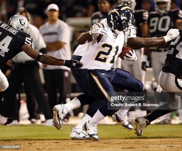 San Diego runningback LaDainian Tomlinson runs for a first down in the second half as the San Diego Chargers defeated the Oakland Raiders by a score...