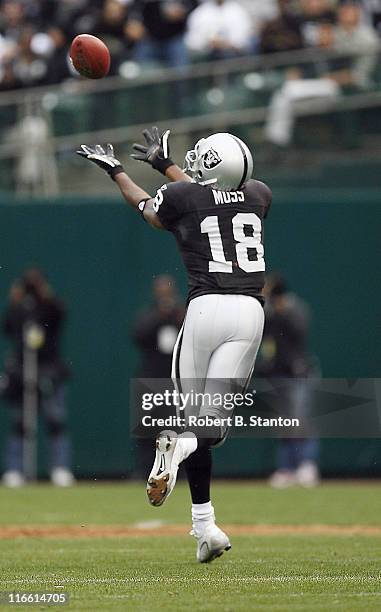 Oakland receiver Randy Moss streches out for one as the Cleveland Browns defeated the Oakland Raiders by a score of 24 to 21 at McAfee Coliseum,...