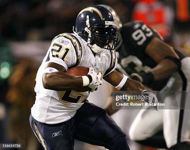 San Diego runningback LaDainian Tomlinson runs for a first down in the second quarter as the San Diego Chargers defeated the Oakland Raiders by a...