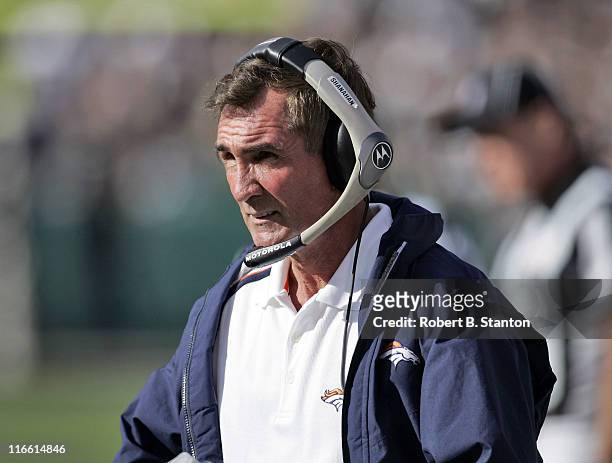 Denver head coach Mike Shanahan watches the third quarter action as the Denver Broncos defeated the Oakland Raiders by a score of 31 to 17 at McAfee...