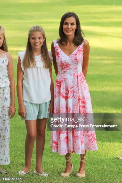 Queen Letizia of Spain and Princess Sofia of Spain pose for the photographers during the summer photocall at the Marivent Palace on August 04, 2019...