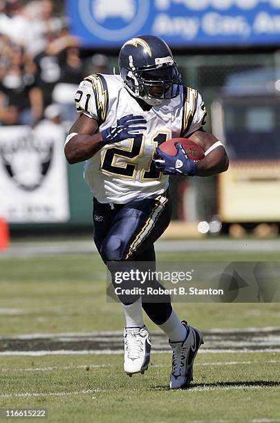 Chargers runningback LaDainian Tomlinson turns upfield in the first half as the San Diego Chargers defeated the Oakland Raiders by a score of 27 to...