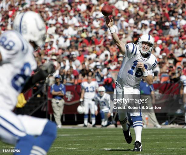 Colts quarterback Peyton Manning fires one to receiver Marvin Harrison in the first half as the Indianapolis Colts defeated the San Francisco 49ers...