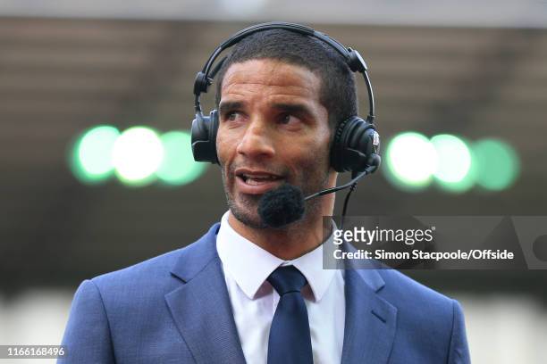 9th August 2015 - Barclays Premier League - Stoke City v Liverpool - Former goalkeeper David James wears headphones and a microphone as he works as a...