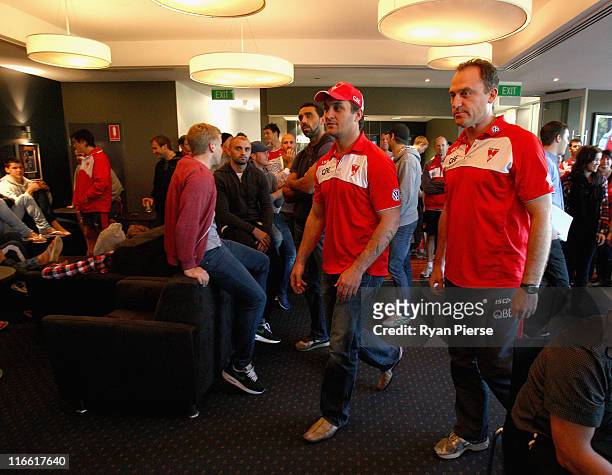 Daniel Bradshaw of the Sydney Swans and arrives at a press conference to announce his retirement from the AFL as John Longmire, coach of the Swans...