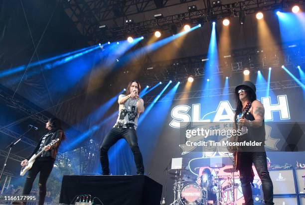 Todd Kerns, Myles Kennedy, and Slash of Slash featuring Myles Kennedy and the Conspirators performs during 2019 Lollapalooza at Grant Park on August...