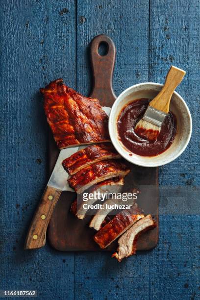 smoke barbecue pork ribs - grill directly above stock pictures, royalty-free photos & images