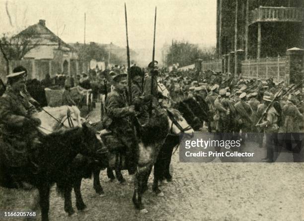 Cossack soldiers, First World War . 'On the Heels of the Invader: a Cossack patrol occupying a Polish village. The German troops had been in...