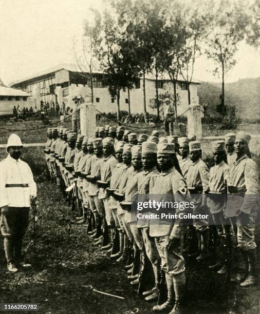 African soldiers fighting for Germany, First World War . 'Germany's Colonial Allies: Native Infantry in East Africa. The hats have the Prussian eagle...