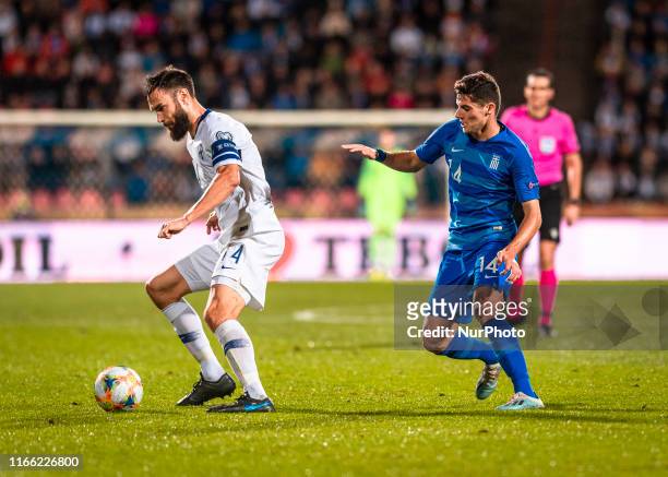 Tim Sparv and Marios Vrousai during the UEFA Finland vs Greece football qualifying round match at Tampere Stadium in Tampere, Finland on 5 September...