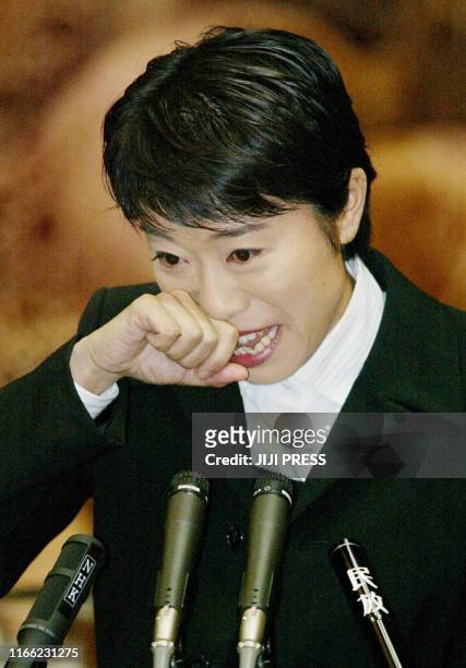 Former opposition lawmaker Kiyomi Tsujimoto, who allegedly misused her secretaries' salaries, sobs out during her testimony as an unsworn witness at...