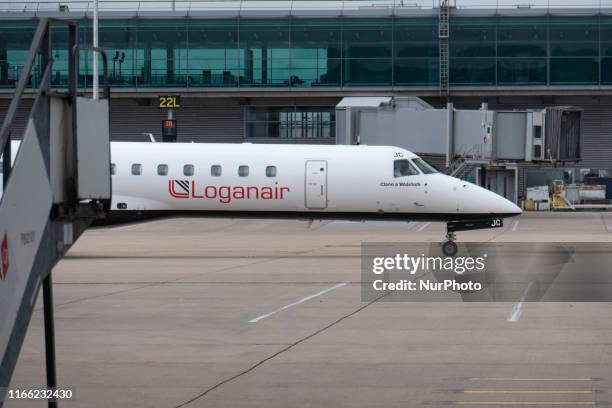 Loganair Embraer ERJ-145 aircraft as seen taxiing at London Stansted International Airport STN EGSS in England, UK on 1st August 2019. The regional...