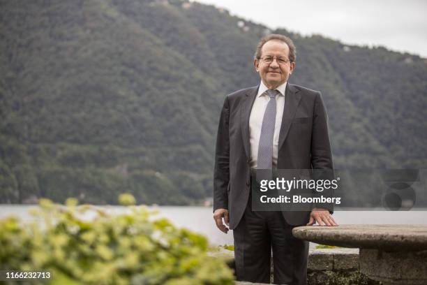 Vitor Constancio, former vice president of the European Central Bank , poses for a photograph following a Bloomberg Television interview on the...