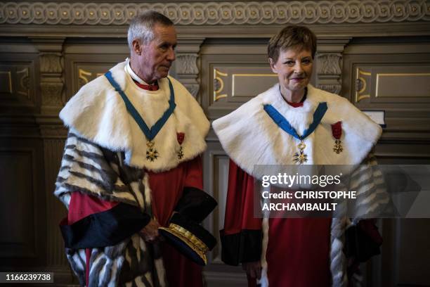 First President of the Court of Cassation Chantal Arens and Attorney General Francois Molins stand following a solemn hearing to install her in the...