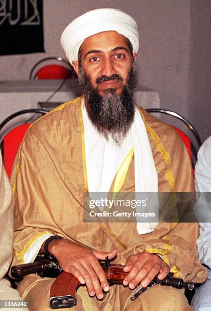 Suspected terrorist Osama bin-Laden is seen in this undated photo in Afghanistan. A Pakistani foreign ministry spokesman said October 4, 2001 that it...