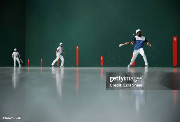 Jose Huarte and Agusti Brugues of the United States plays against Alfredo Villegas and Pablo Fusto of Argentina in their men's doubles fronton...