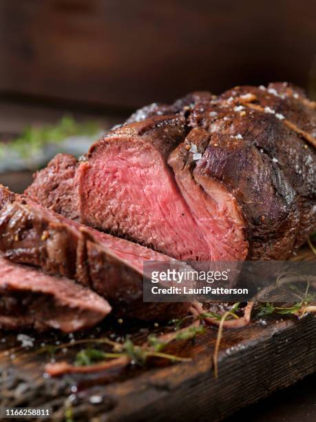 venison, elk sirloin tip roast - beef stock pictures, royalty-free photos & images