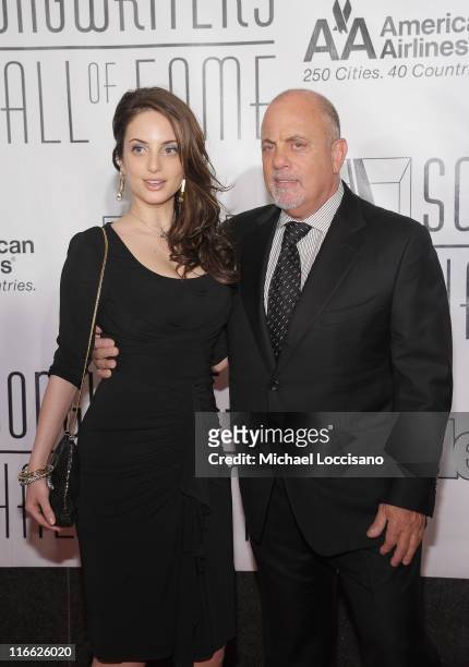 Musicians/father and daughter Alexa Ray Joel and Billy Joel attend the 42nd annual Songwriters Hall of Fame Induction Ceremony at The New York...