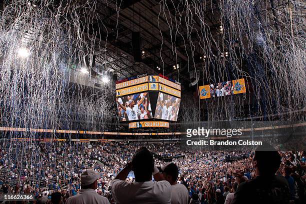 Confetti rains down from the rafters in the culmination of the Dallas Mavericks NBA Champion Victory Parade on June 16, 2011 at the American Airlines...
