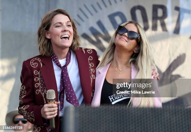 Maren Morris and Brandi Carlile perform as part of the Collaboration during day two of the 2019 Newport Folk Festival at Fort Adams State Park on...