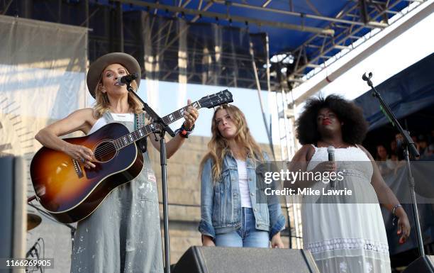Sheryl Crow, Maggie Rogers and Yola perform as part of the Collaboration during day two of the 2019 Newport Folk Festival at Fort Adams State Park on...