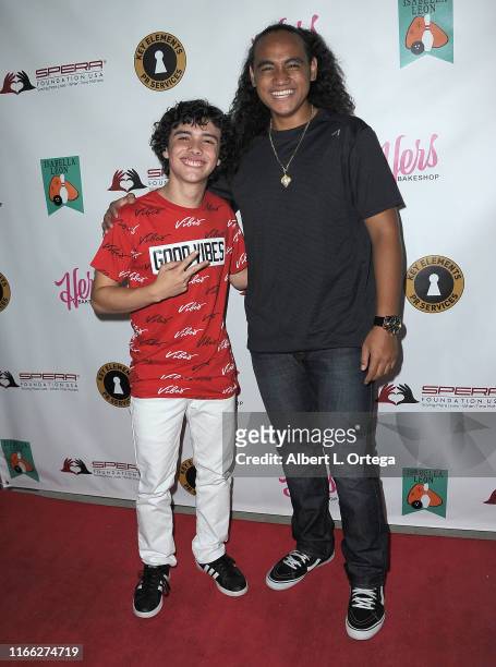 Hunter Payton Mendoza and Siaki Sii attend Isabella Leon's 12th Birthday Party held at Montrose Bowl on September 5, 2019 in Montrose, California.
