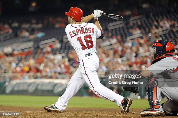 Danny Espinosa of the Washington Nationals hits the game winning three run home run in the tenth inning against the St. Louis Cardinals at Nationals...