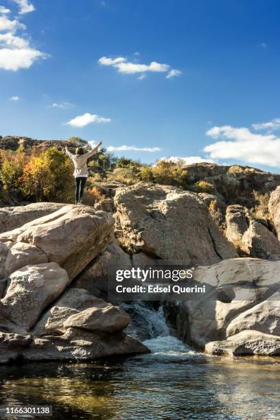 adult woman enjoying nature. lifestyles and freedom concepts. - cordoba province argentina stock pictures, royalty-free photos & images