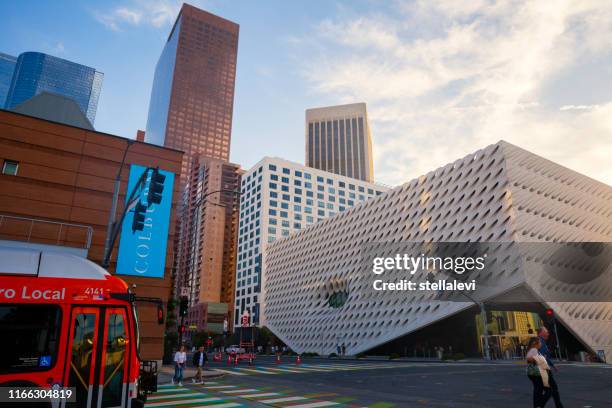 los angeles downtown- the broad museum at grand avenue with skyscrapers - los angeles county museum stock pictures, royalty-free photos & images