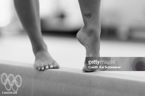 Detail view of an Olympics tattoo of New Zealand gymnast Courtney McGregor during a portrait session at Christchurch School of Gymnastics on August...