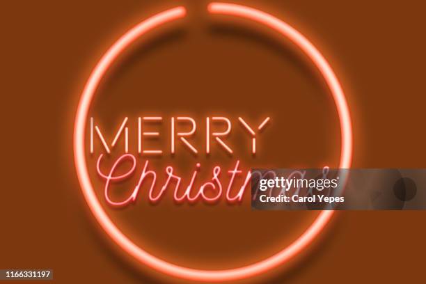 merry xmas message inneon text - neon speech bubble stock-fotos und bilder