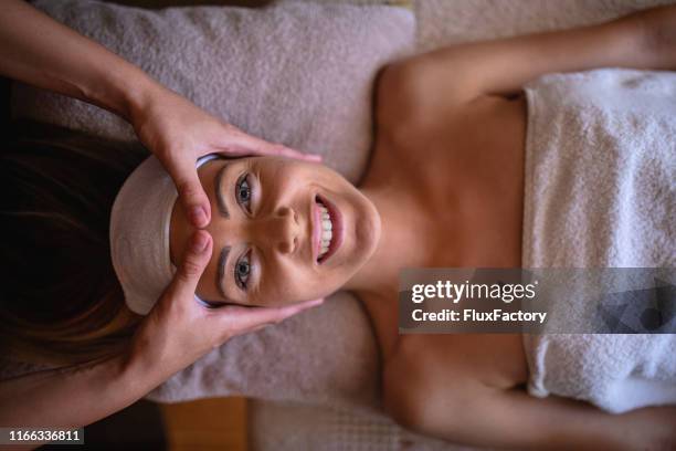 spa day! - massager stock pictures, royalty-free photos & images