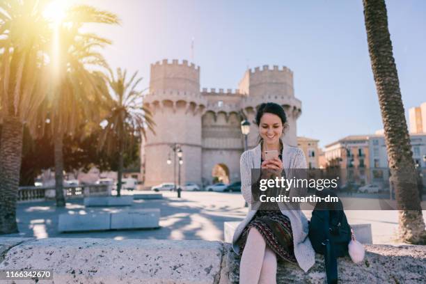 tourist woman in valencia - city gate stock pictures, royalty-free photos & images