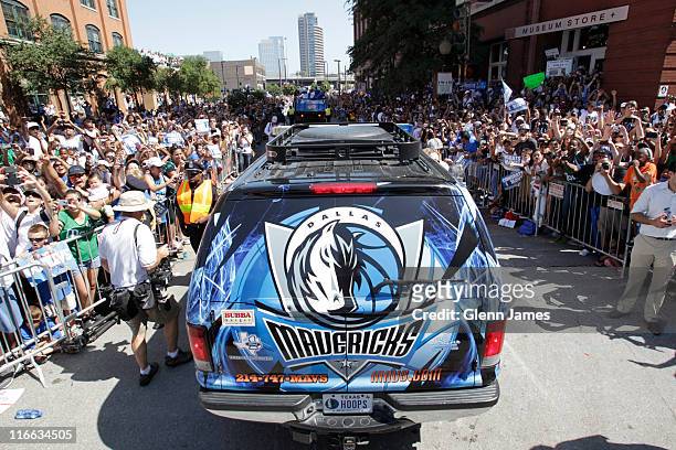 Fans of the Dallas Mavericks crowd the streets during the Mavericks NBA Champion Victory Parade on June 16, 2011 at the American Airlines Center in...