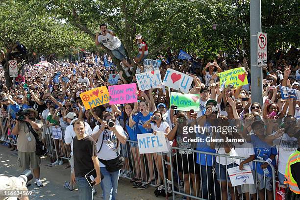 Fans of the Dallas Mavericks crowd the streets during the Mavericks NBA Champion Victory Parade on June 16, 2011 at the American Airlines Center in...