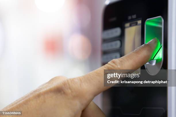 businessman hand scanning finger on machine,technology concept, business concept, - entering data stock pictures, royalty-free photos & images