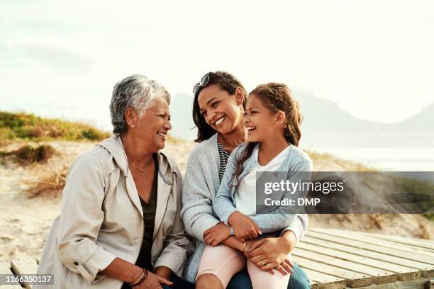 we see so much of ourselves in her - multi generation family beach stock pictures, royalty-free photos & images