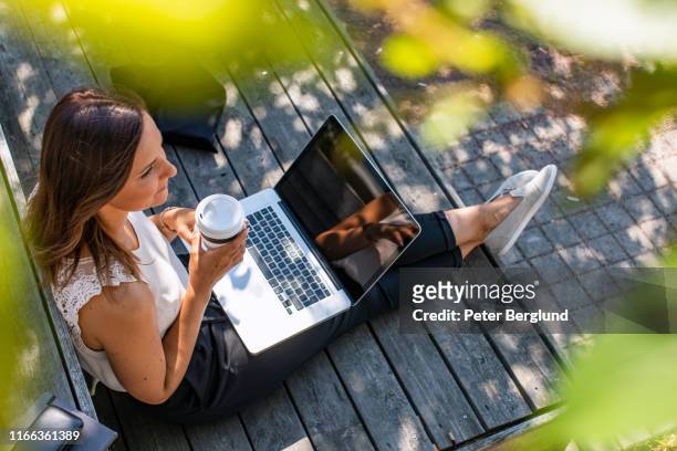 woman studying/working - goteborg stock pictures, royalty-free photos & images