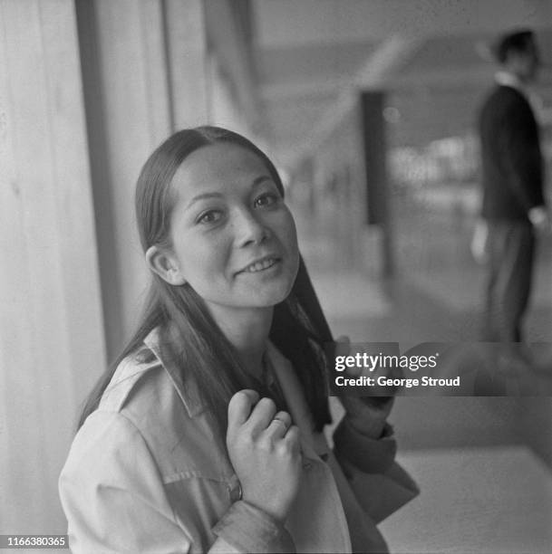 Hong Kong American actress Nancy Kwan at Heathrow Airport, London, UK, 27th April 1965.