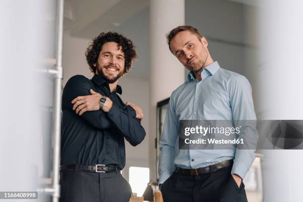business partners in a coffee shop waiting for customers - company founder stock pictures, royalty-free photos & images