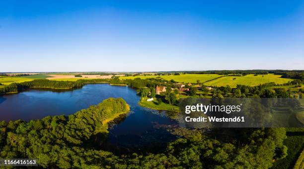 germany, mecklenburg-western pomerania, mecklenburg lake district, schwinkendorf, aerial view of ulrichshuser see and ulrichshusen castle - mecklenburger seenplatte stock-fotos und bilder