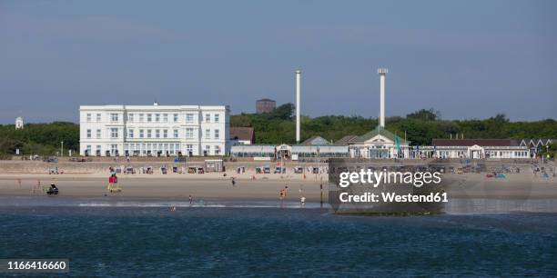 germany, lower saxony, east frisia, norderney, west beach and haus am weststrand - norderney stock pictures, royalty-free photos & images