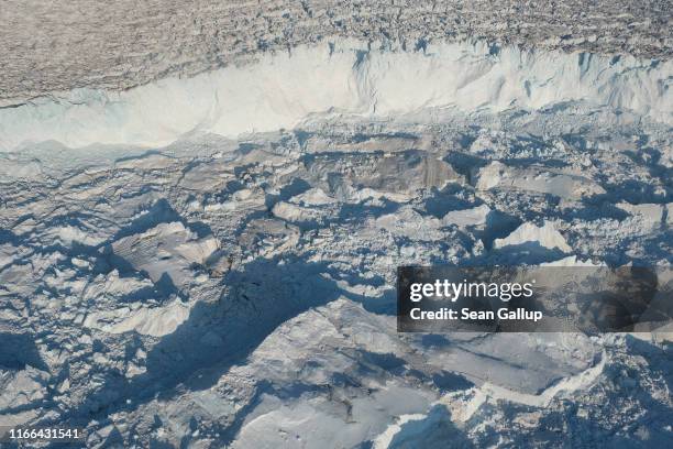 In this view from an airplane the Sermeq Kujalleq glacier , also called the Jakobshavn glacier, discharges ice into the Ilulissat Icefjord on August...