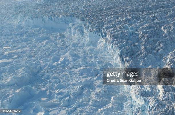 In this view from an airplane the Sermeq Kujalleq glacier , also called the Jakobshavn glacier, discharges ice into the Ilulissat Icefjord on August...