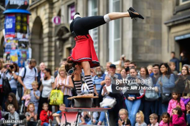 Edinburgh Festival Fringe entertainers perform on the Royal Mile on August 6, 2019 in Edinburgh, Scotland. The festival takes place in the Scottish...